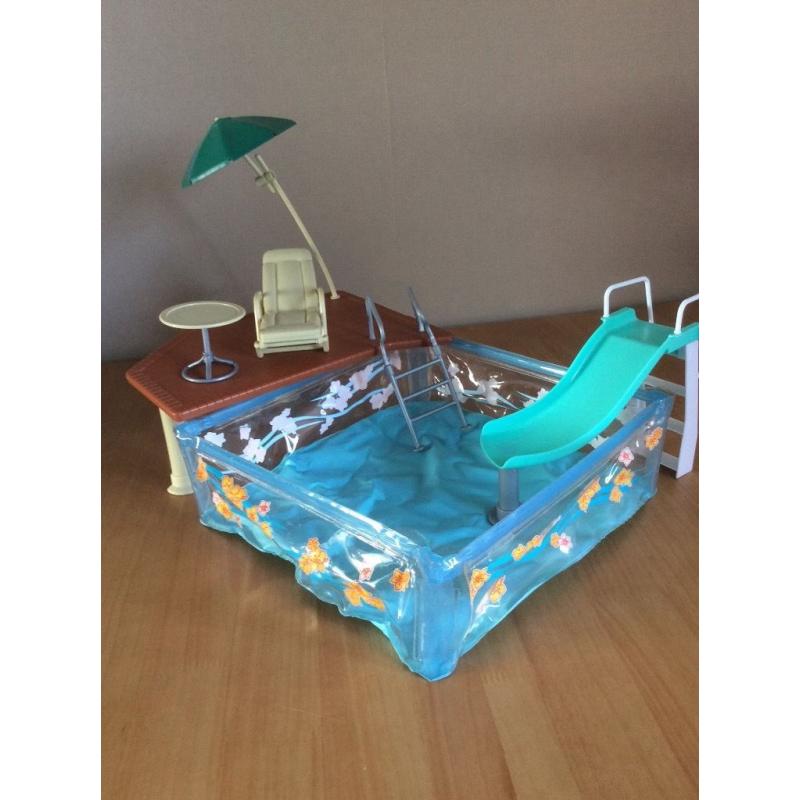 Barbie type doll pool set.