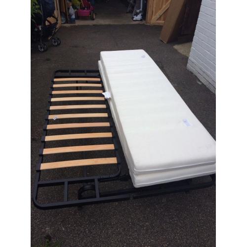 Futon sofa bed with mattress. Foldable. Fits two adults. Good condition.