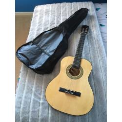 Small acoustic guitar and case