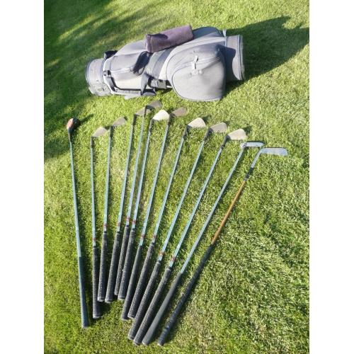 Complete set of golf clubs including bag & balls, good condition