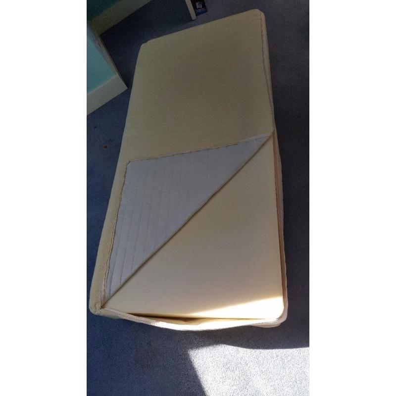 Single memory foam mattress with washable cover.