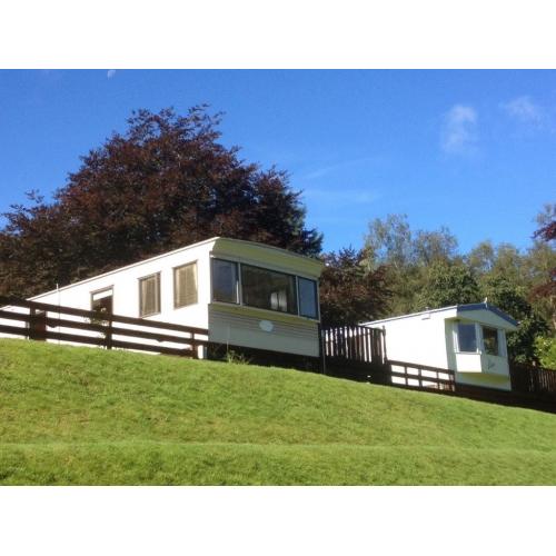 Cosalt Capri Super 35x12 3 bedroom static caravan for sale with a large wooden decking & many extras