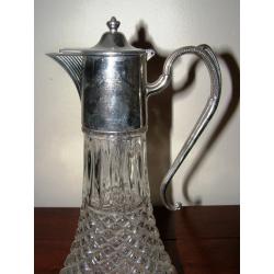 Vintage Claret Jug - A vintage claret jug with silver plated mounts