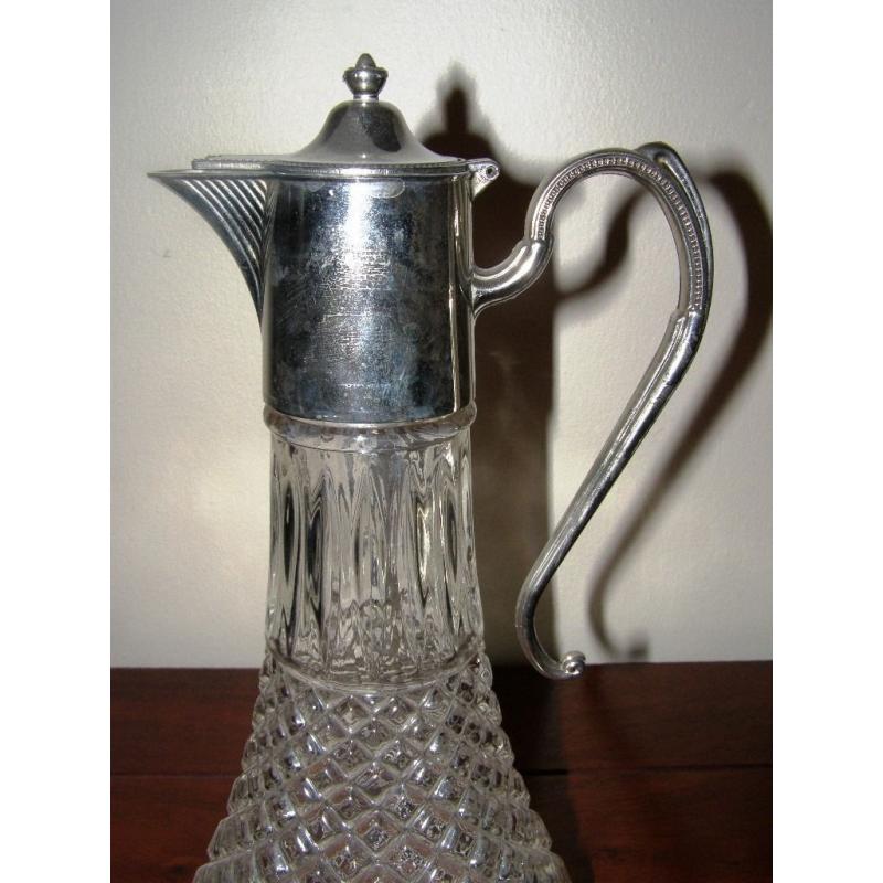 Vintage Claret Jug - A vintage claret jug with silver plated mounts