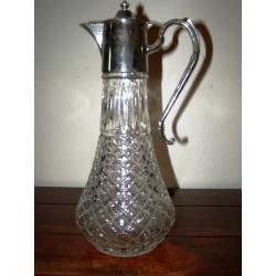 Vintage Claret Jug - A vintage claret jug with silver plated mounts