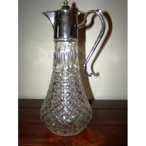 Vintage Claret Jug - A vintage claret jug with silver plated mounts
