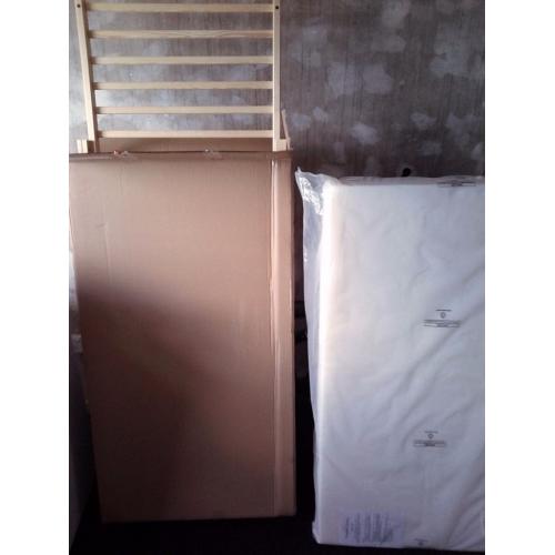 Babys cot with mattress both brand new still in box