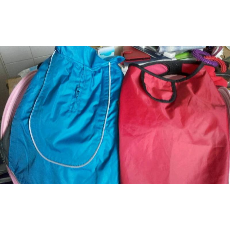 Two extra small dog raincoats.
