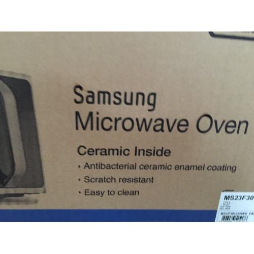 Brand new Samsung microwave. Still in box. Now half price.