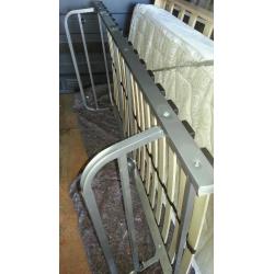 Slide under bed frame/guest bed.