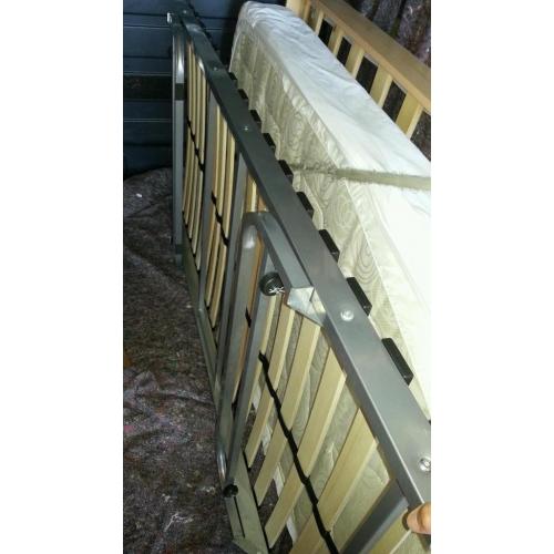 Slide under bed frame/guest bed.