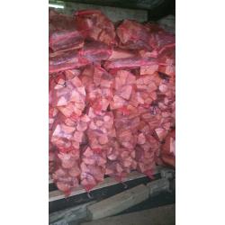 Hardwood logs all split and seasoned dried , net bags of kindlin also