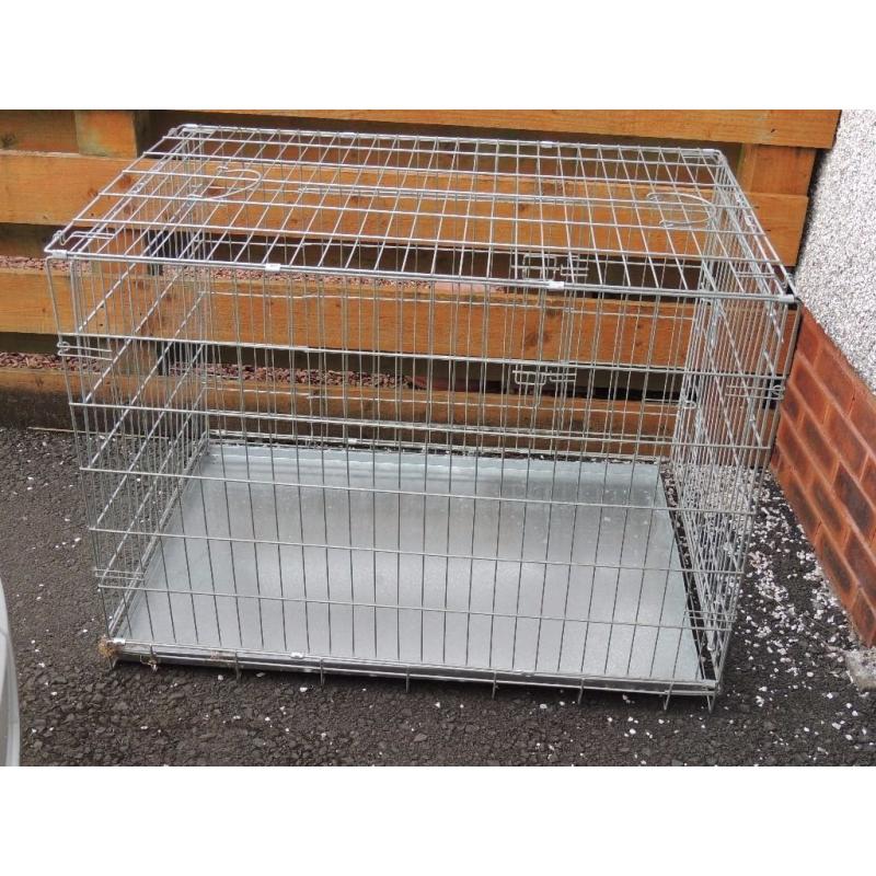 Large dog crate 70x80x100 Hardly used. In very good condition