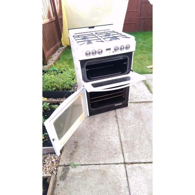 Gas cooker with electric oven and grill for free.