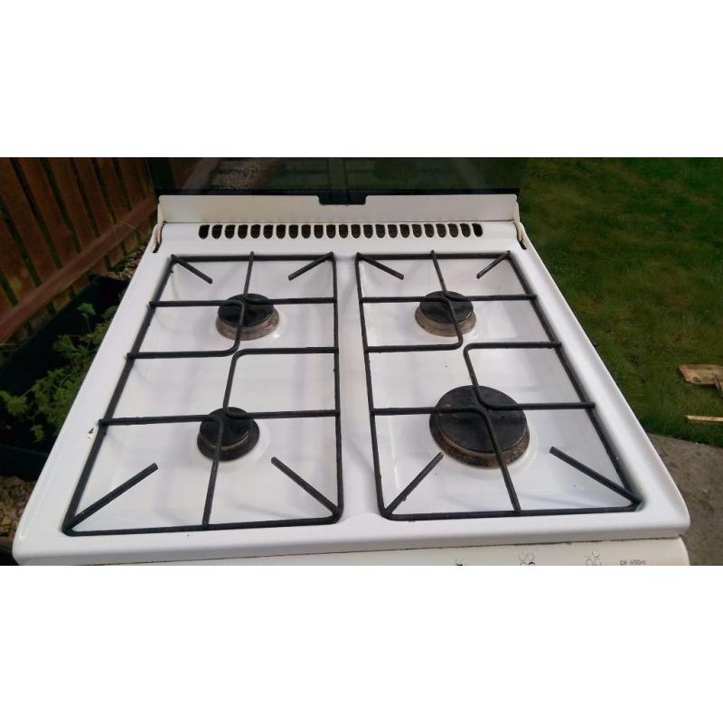 Gas cooker with electric oven and grill for free.
