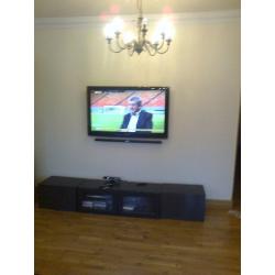 Plasma and LCD Tvs wall mounted. All cables hidden