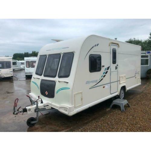 2010 BAILEY OLYMPUS FIXED BED INC, FITTED MOTORMOVER CORNER WASHROOM