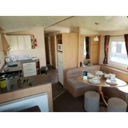 STATIC CARAVAN FOR SALE WITH SITE FEES ONLY ?2,400!!! DOUBLE GLAZED AND HEATED