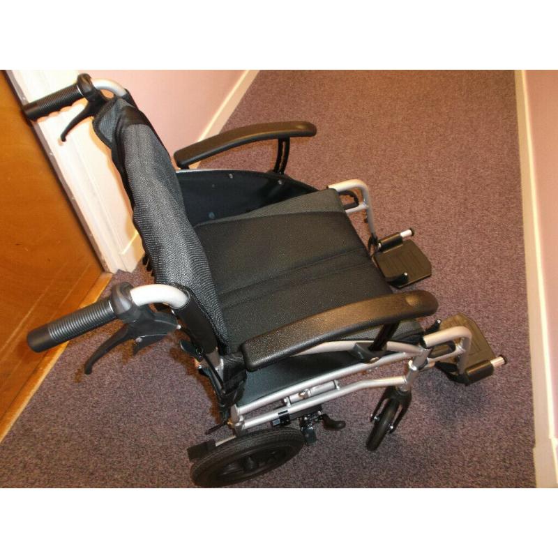 Wheelchair 2mths old never used (?250 new) Plus Warm Waterproof Cover