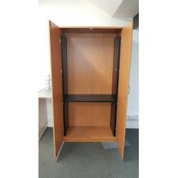 Tall wooden storage cupboard