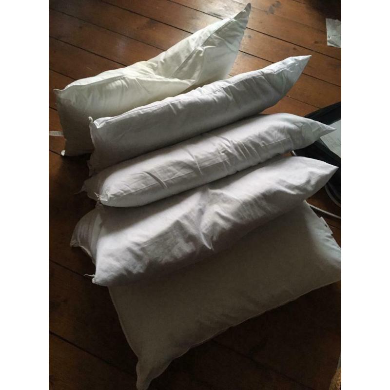 Five used pillows