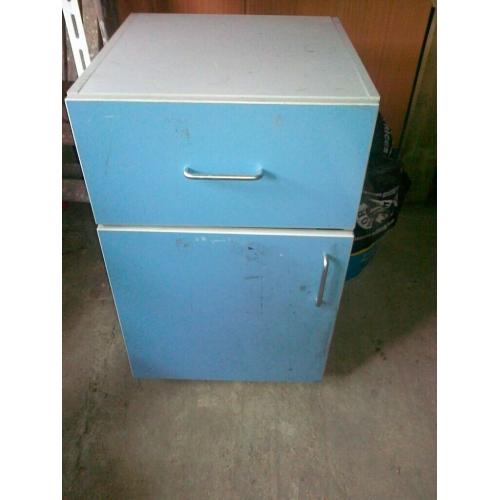 pale blue malamine cupboard on castors