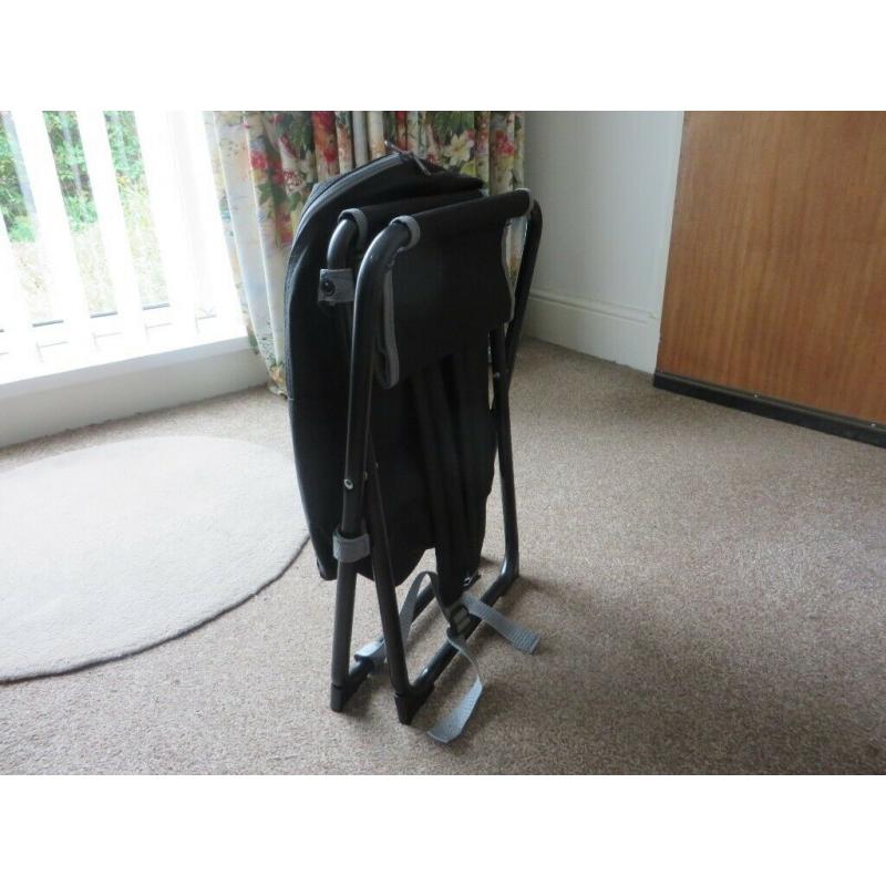Backpack with integral folding stool.