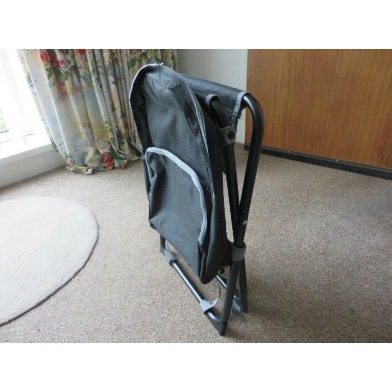 Backpack with integral folding stool.