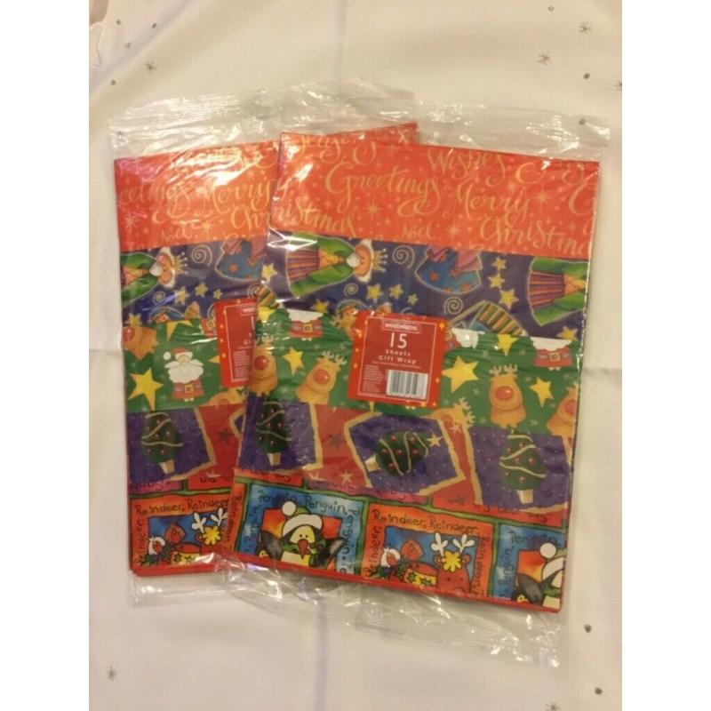 For sale Pack of 15 sheets Christmas wrapping paper 50p