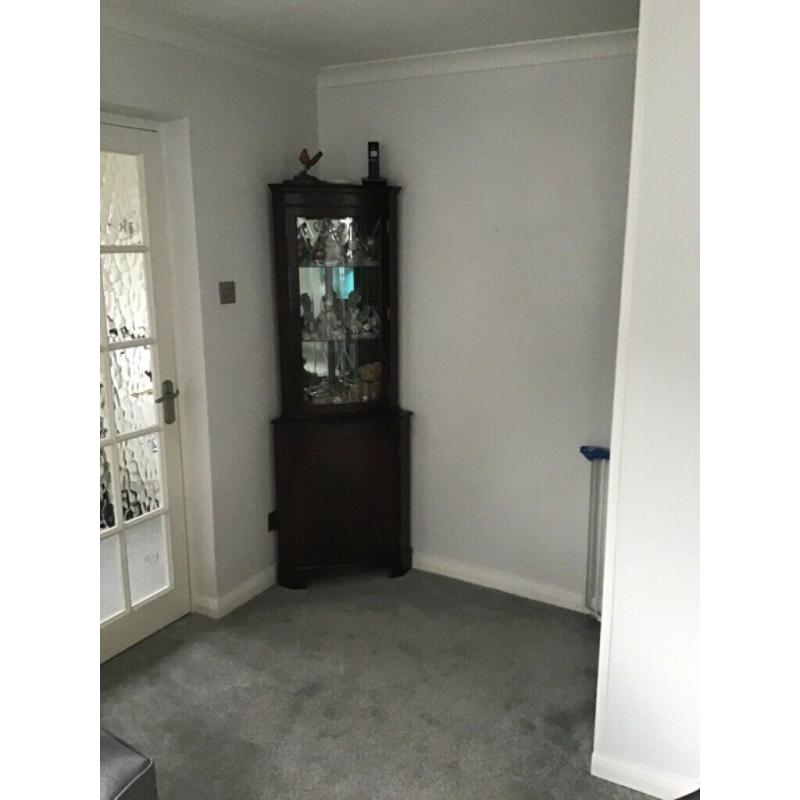 Corner display cupboard.