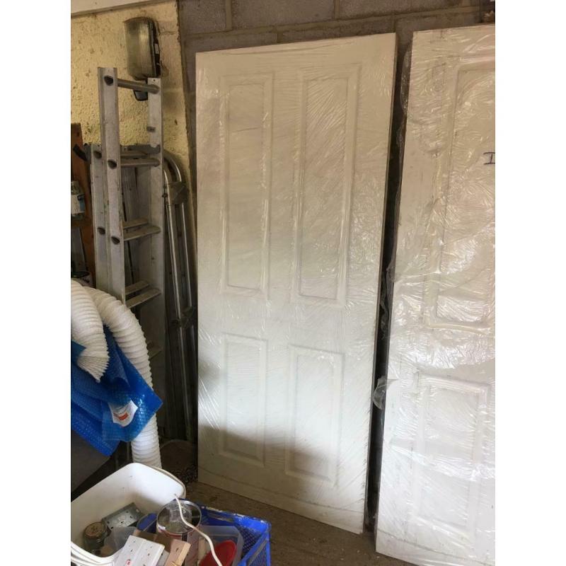 Jeldwen 4 panel moulded textured fire door