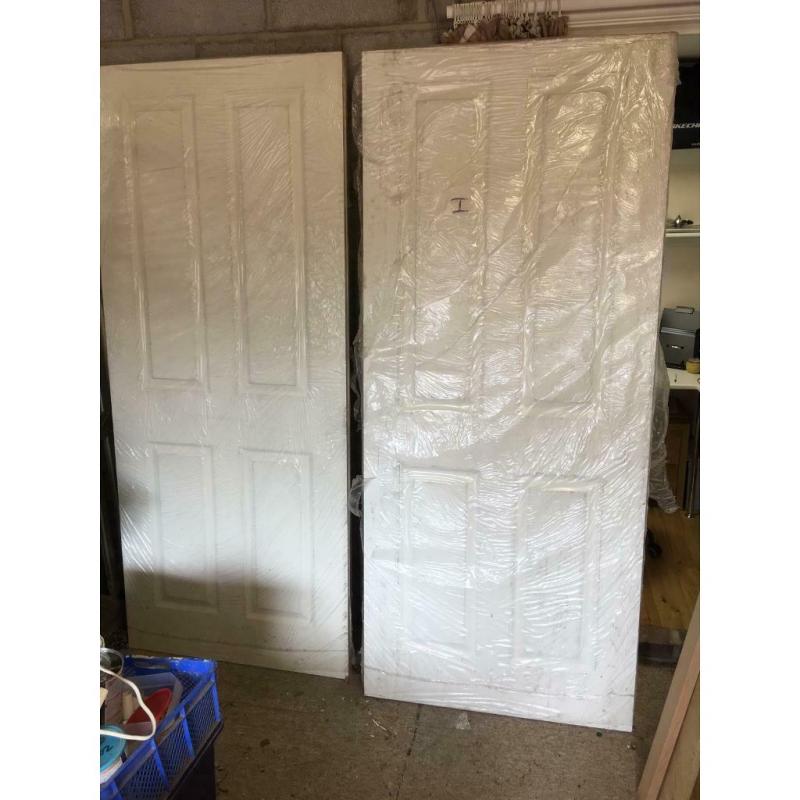 Jeldwen 4 panel moulded textured fire door