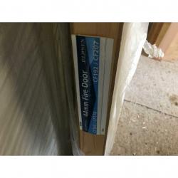 Jeldwen 4 panel moulded textured fire door