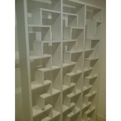 very large unusual bookcase or bookshelf or shelving unit can deliver