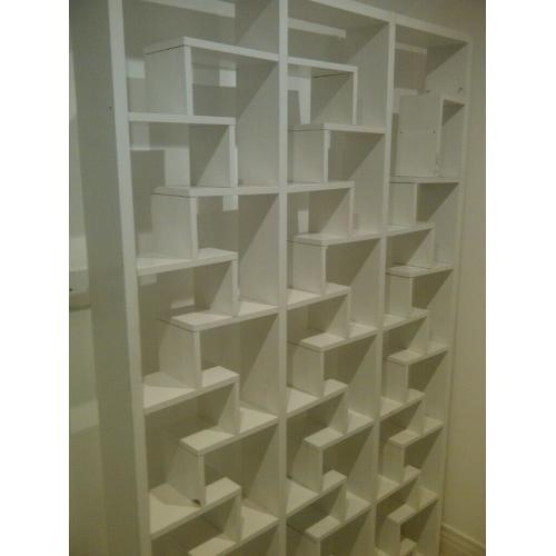 very large unusual bookcase or bookshelf or shelving unit can deliver