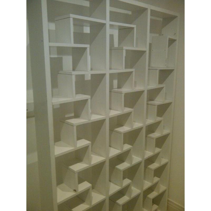 very large unusual bookcase or bookshelf or shelving unit can deliver