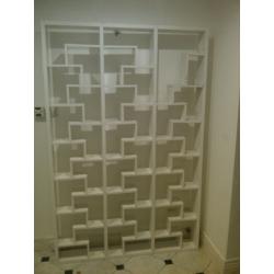 very large unusual bookcase or bookshelf or shelving unit can deliver