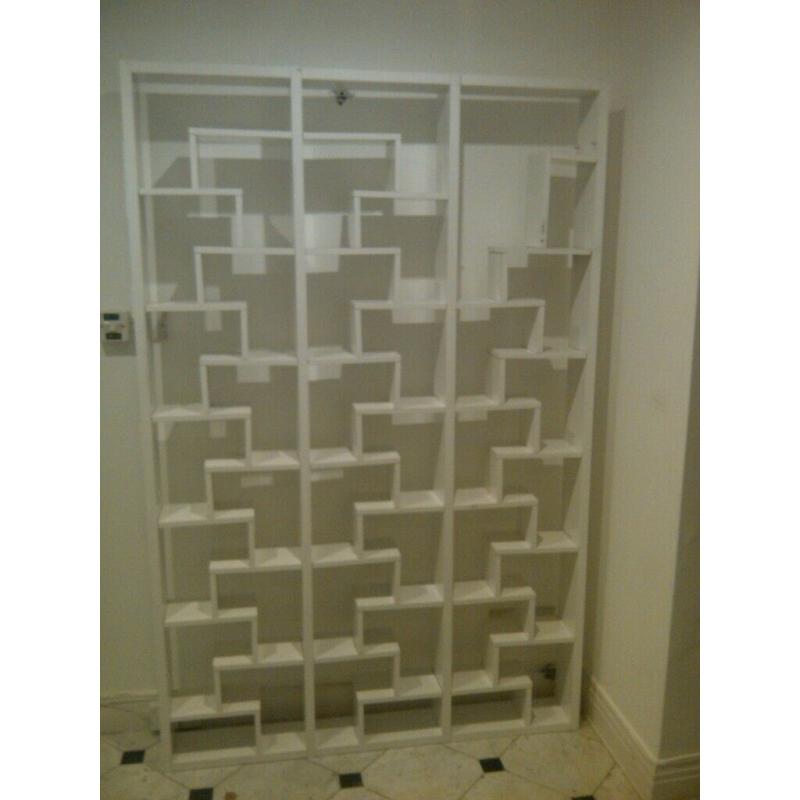 very large unusual bookcase or bookshelf or shelving unit can deliver