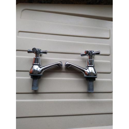 Chrome basin taps