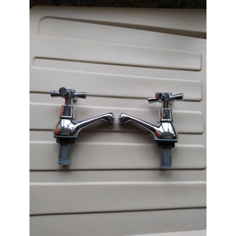 Chrome basin taps