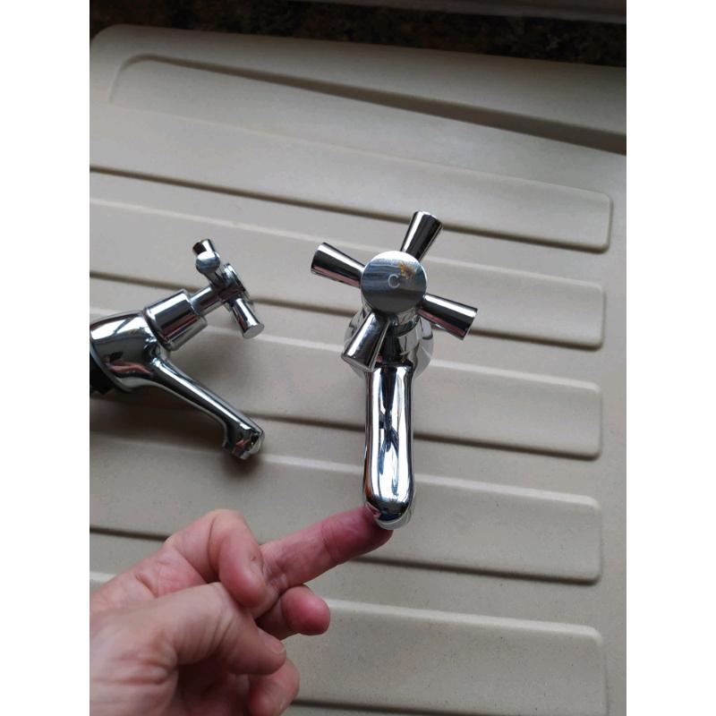 Chrome basin taps