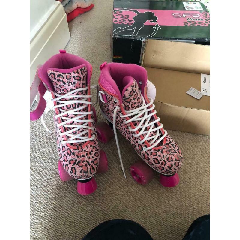 SFR quad leopard pink rollerskates size UK 4