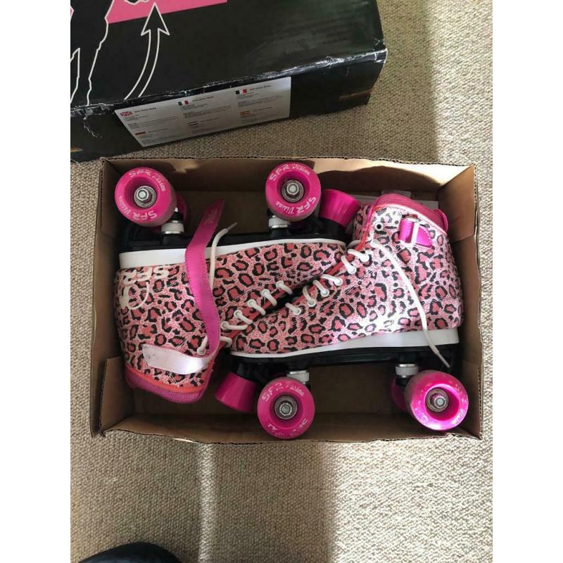 SFR quad leopard pink rollerskates size UK 4
