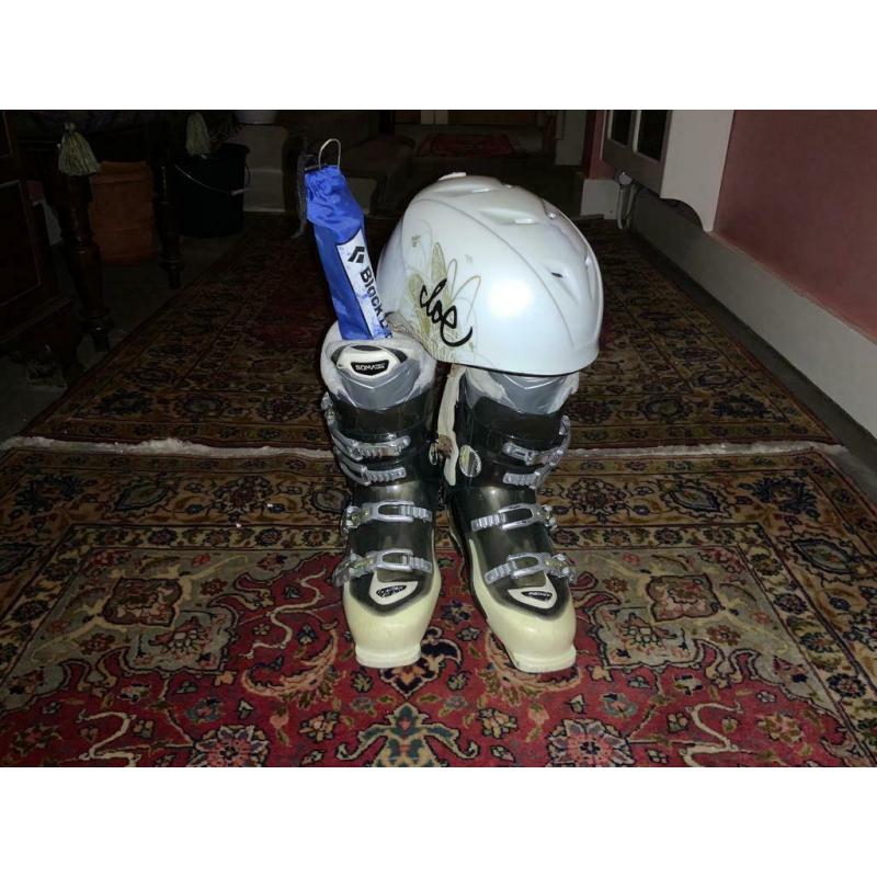 Ladies size 7 ski boots, helmet and avalanche probe.
