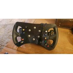 Thrustmaster steering wheel add on.