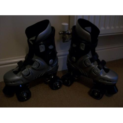 As new Kids Phoenix quad roller skates-size 2(will also fit sizes 12 to 3)super condition