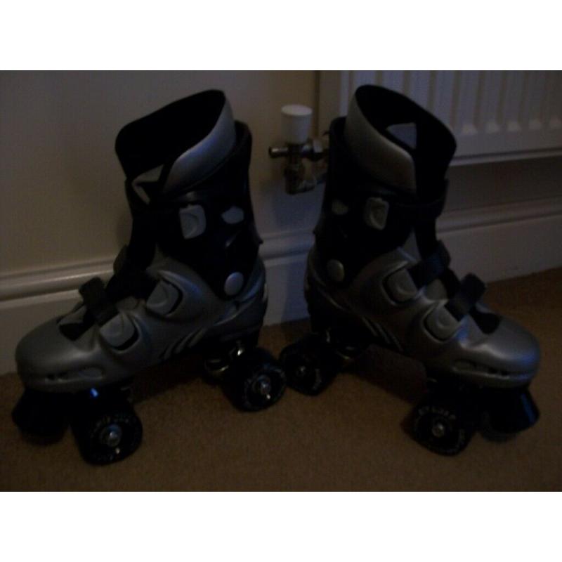 As new Kids Phoenix quad roller skates-size 2(will also fit sizes 12 to 3)super condition