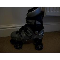 As new Kids Phoenix quad roller skates-size 2(will also fit sizes 12 to 3)super condition