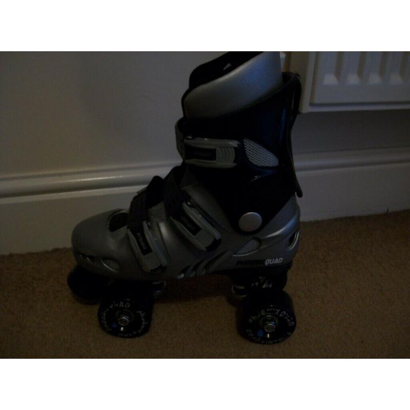As new Kids Phoenix quad roller skates-size 2(will also fit sizes 12 to 3)super condition