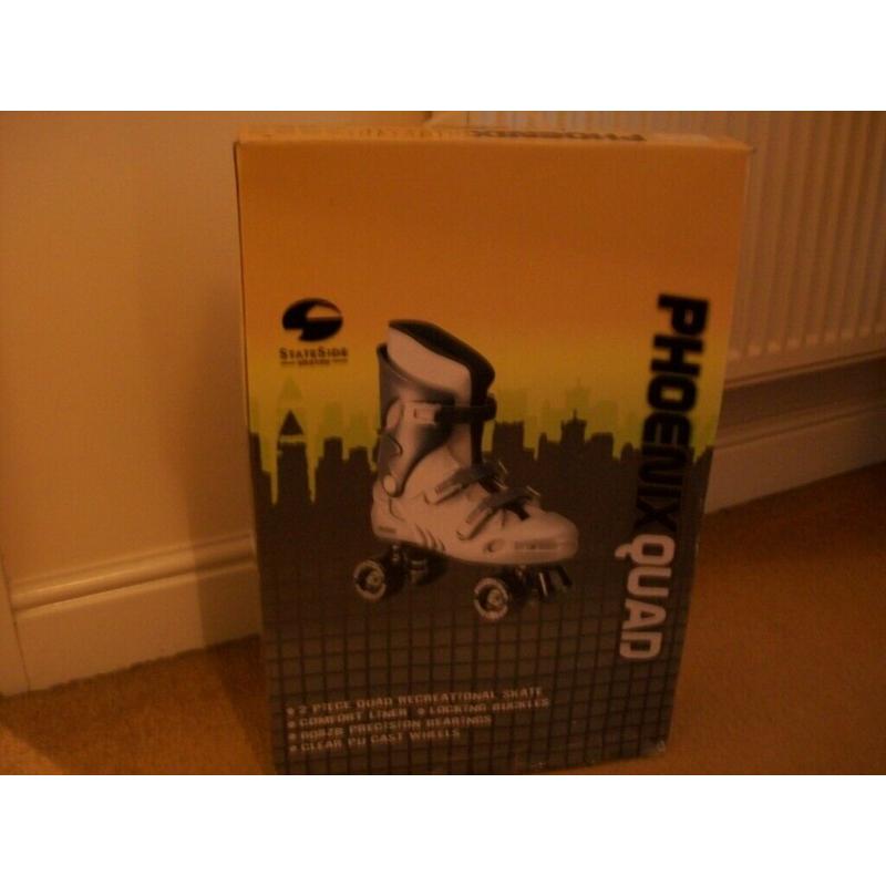 As new Kids Phoenix quad roller skates-size 2(will also fit sizes 12 to 3)super condition